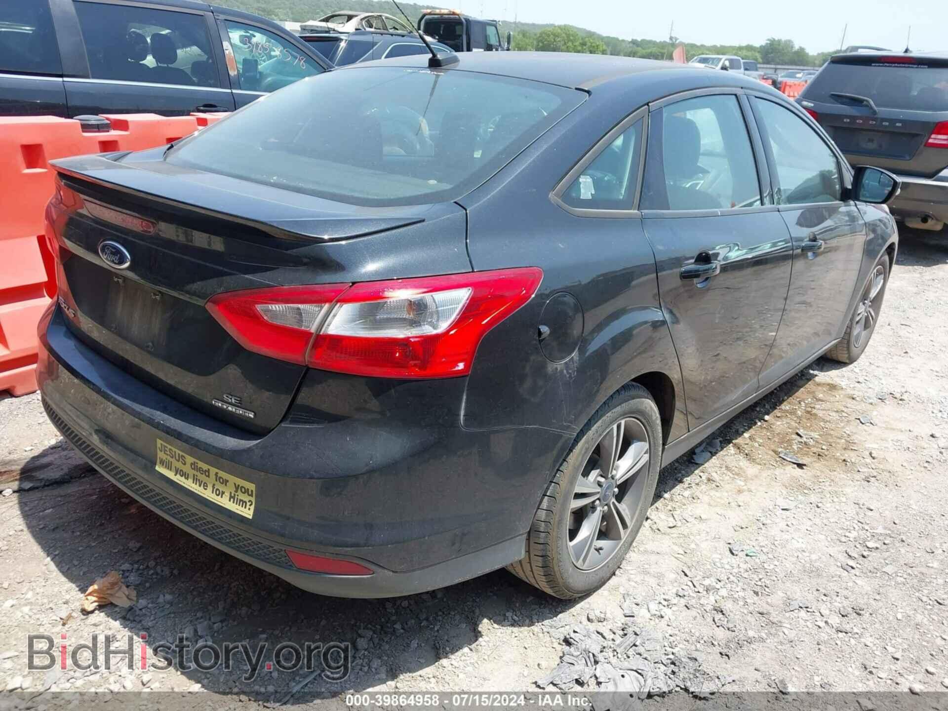 2014 FORD FOCUS - VIN: 1FADP3F22EL321069 - Photo 4
