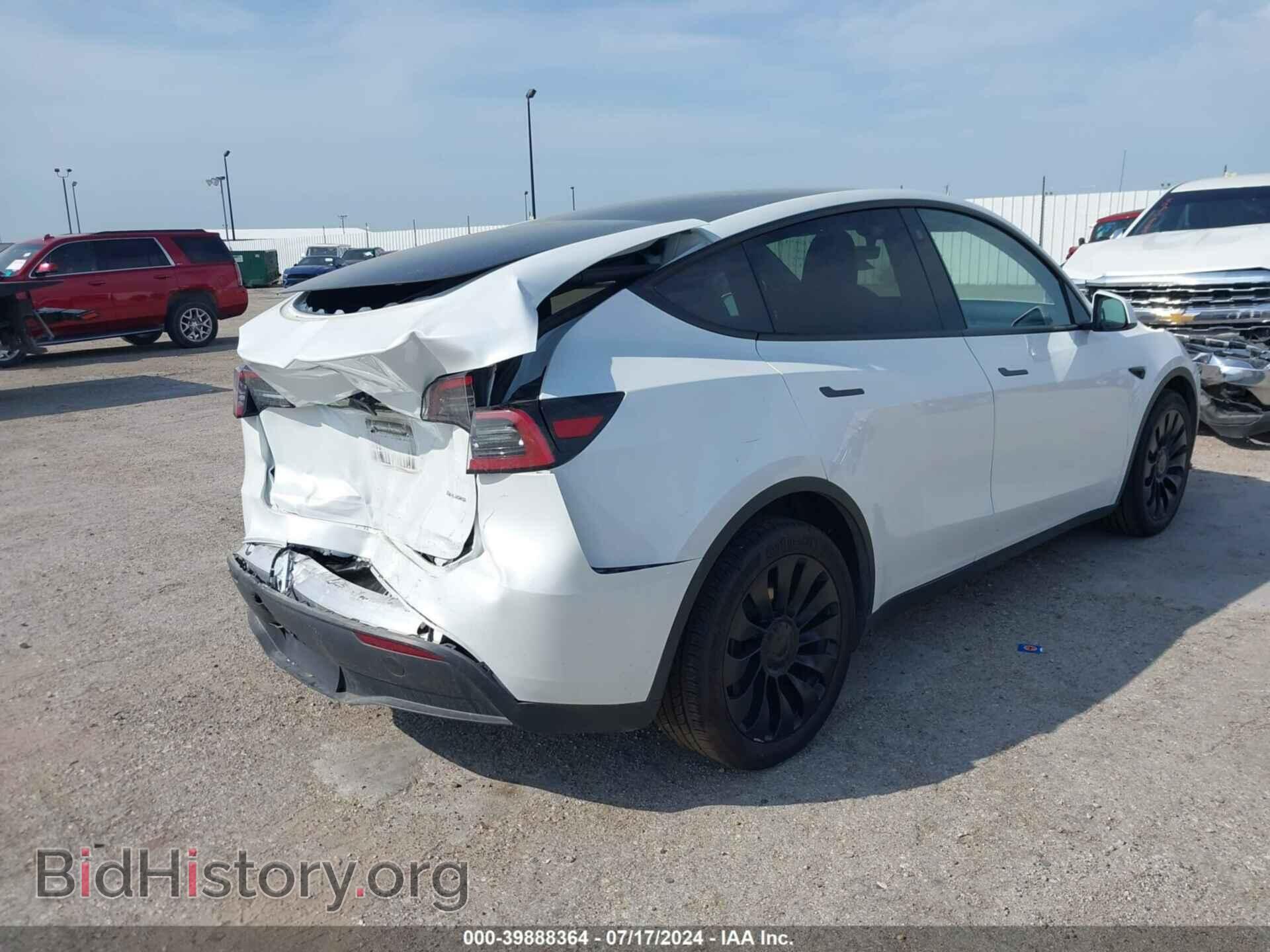 2023 TESLA MODEL Y - VIN: 7SAYGDEEXPA059529 - Фото 4