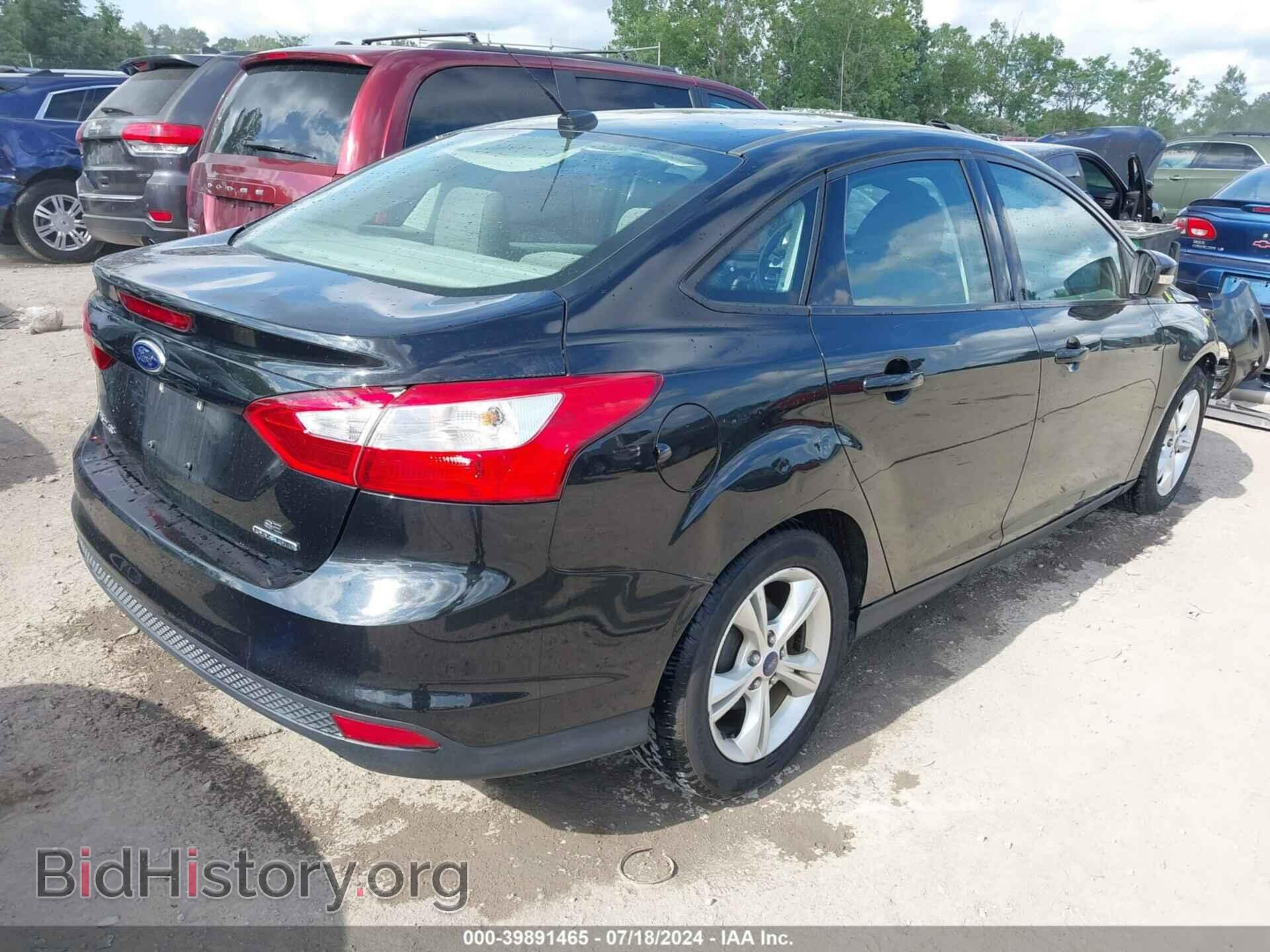 2014 FORD FOCUS - VIN: 1FADP3F27EL245252 - Photo 4