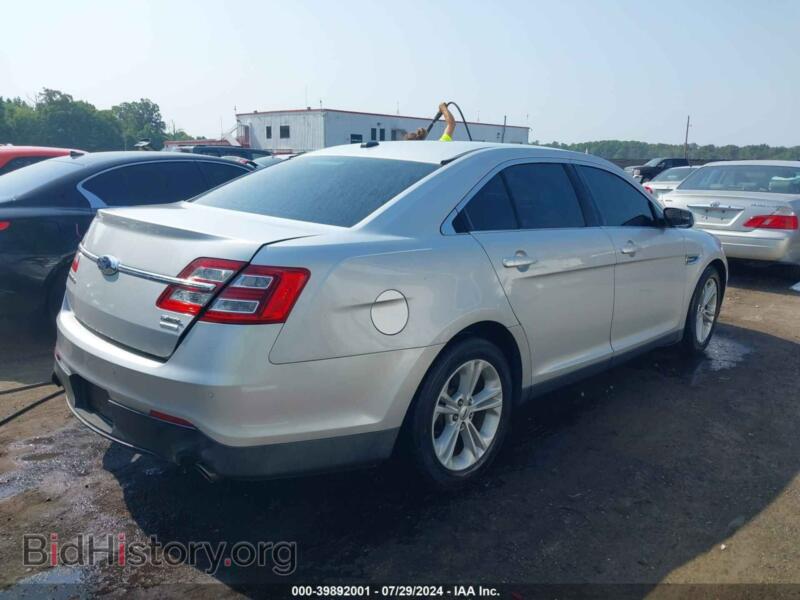 2014 Ford TAURUS (VIN 1FAHP2E97EG184679) — photo 4 of 16