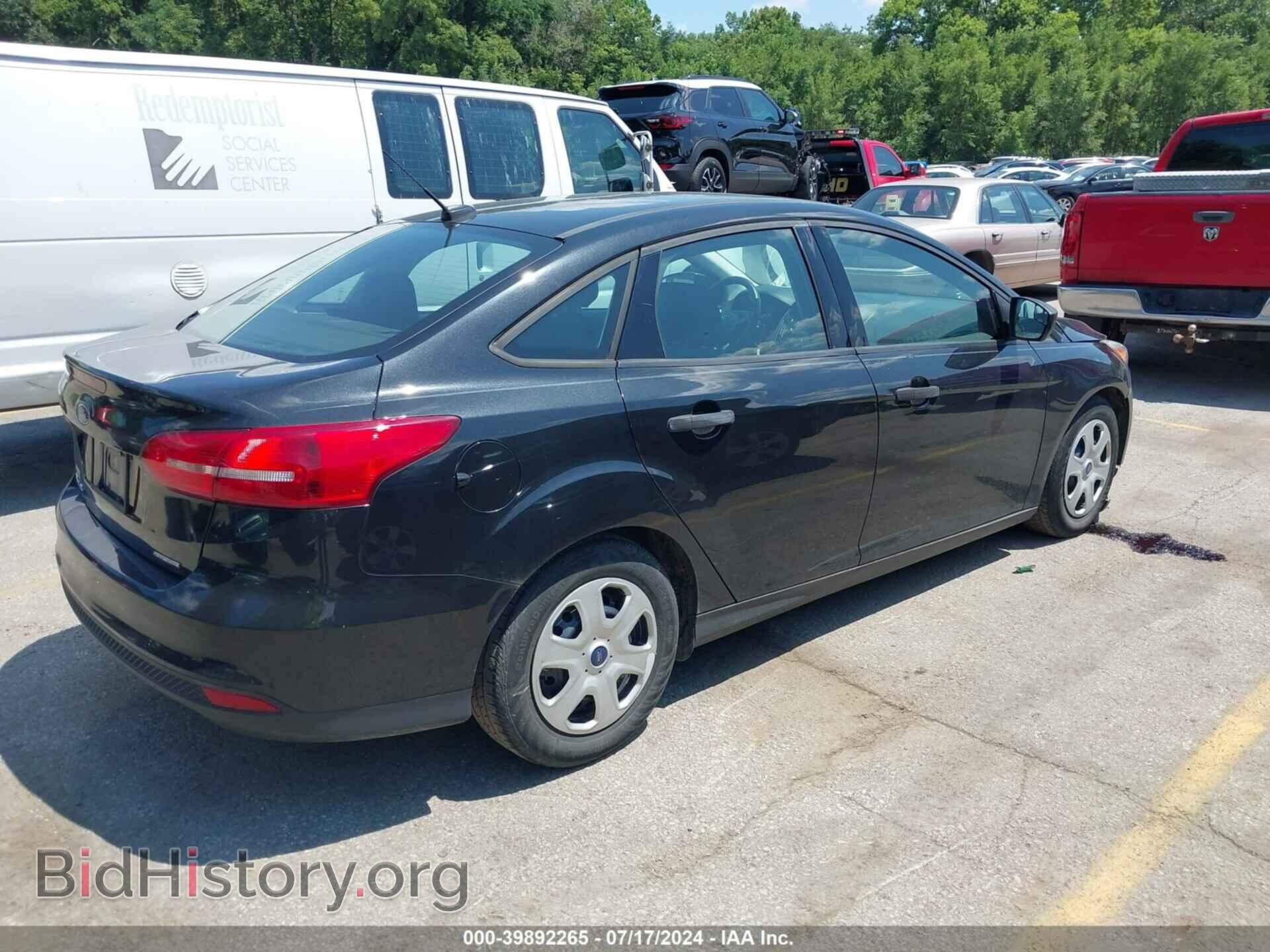 2015 FORD FOCUS - VIN: 1FADP3E20FL323860 - Photo 4