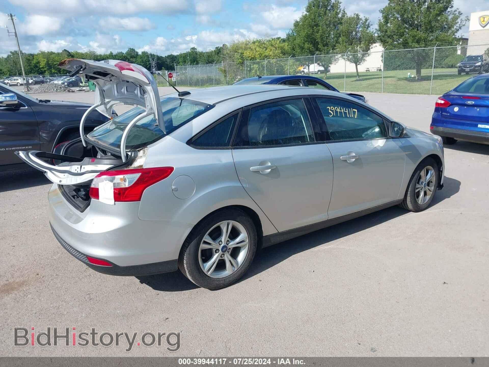 2014 FORD FOCUS - VIN: 1FADP3F2XEL162852 - Photo 4