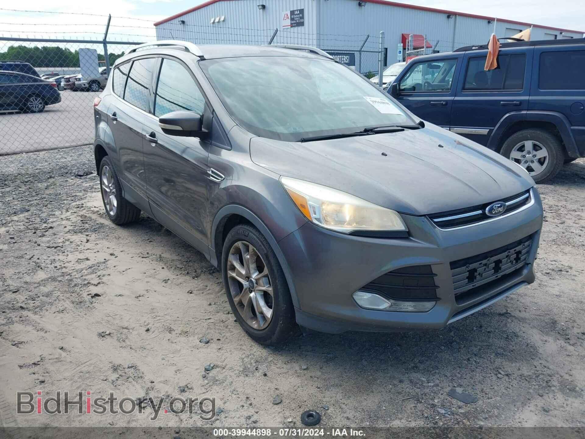 Фотография 1FMCU0JX8EUB93670 - FORD ESCAPE 2014