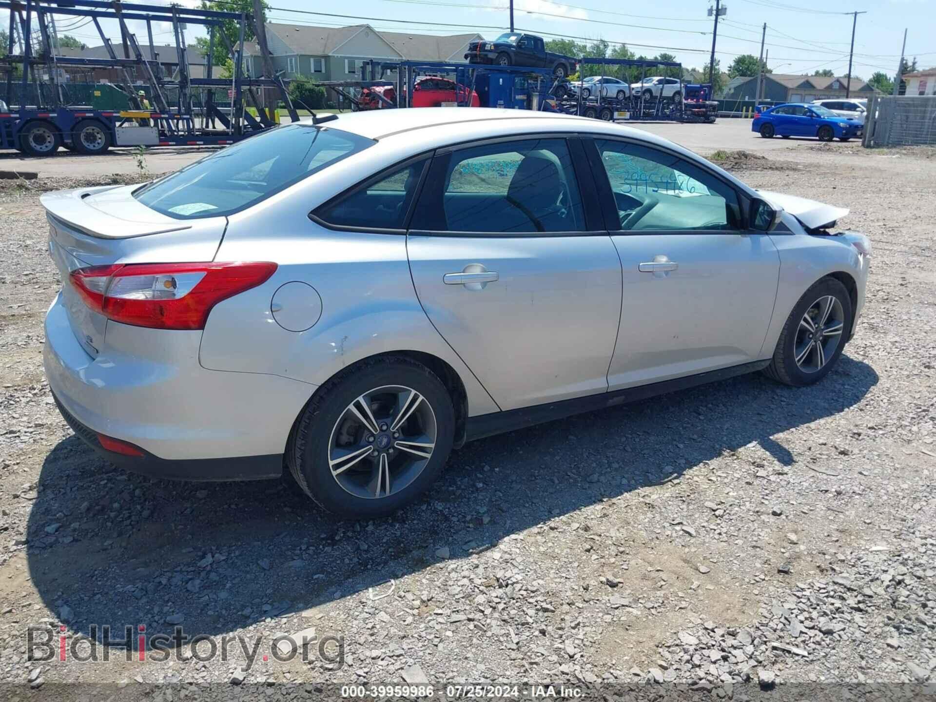 2014 FORD FOCUS - VIN: 1FADP3F29EL160896 - Photo 4