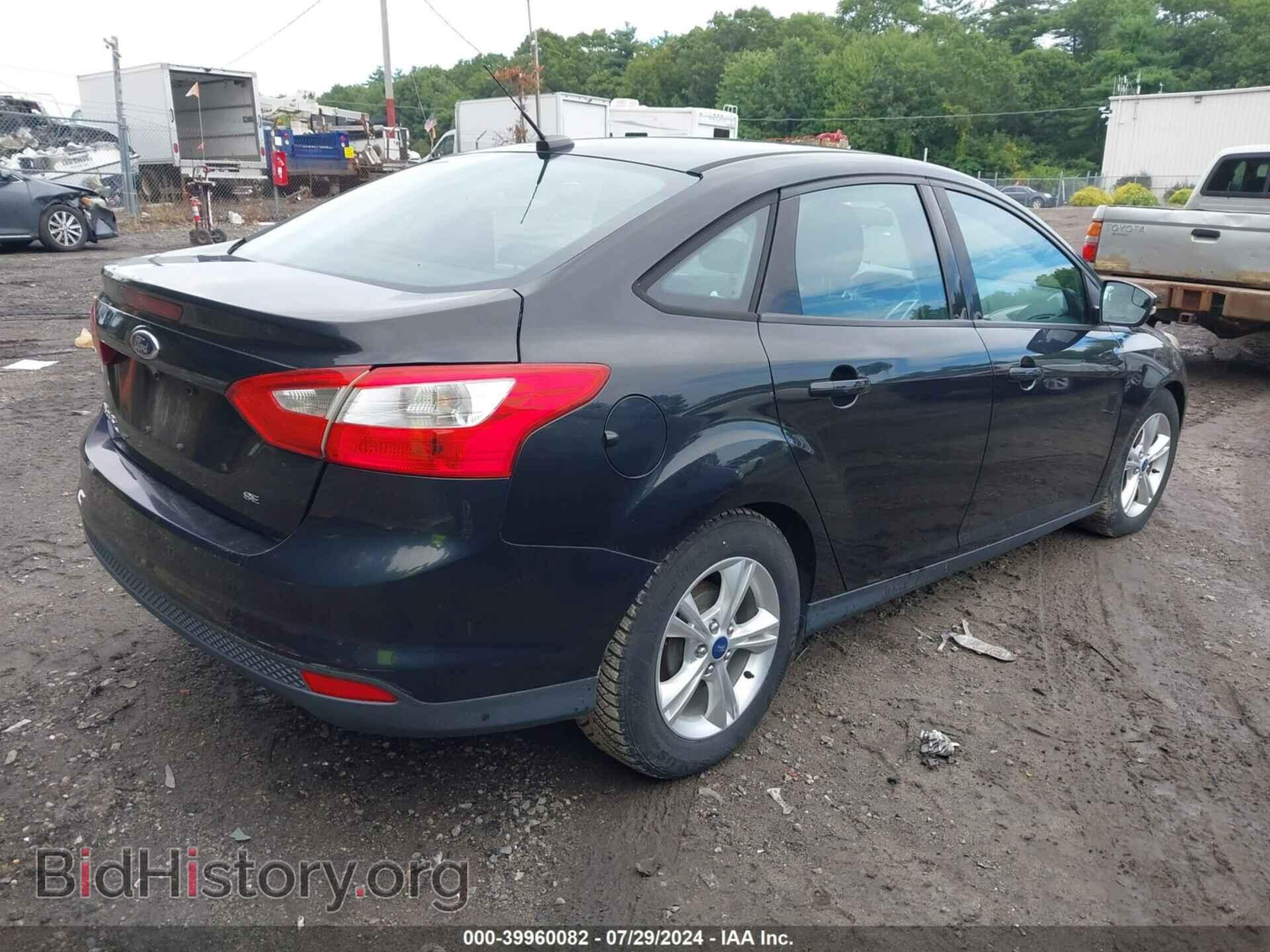 2014 FORD FOCUS - VIN: 1FADP3F28EL164311 - Photo 4