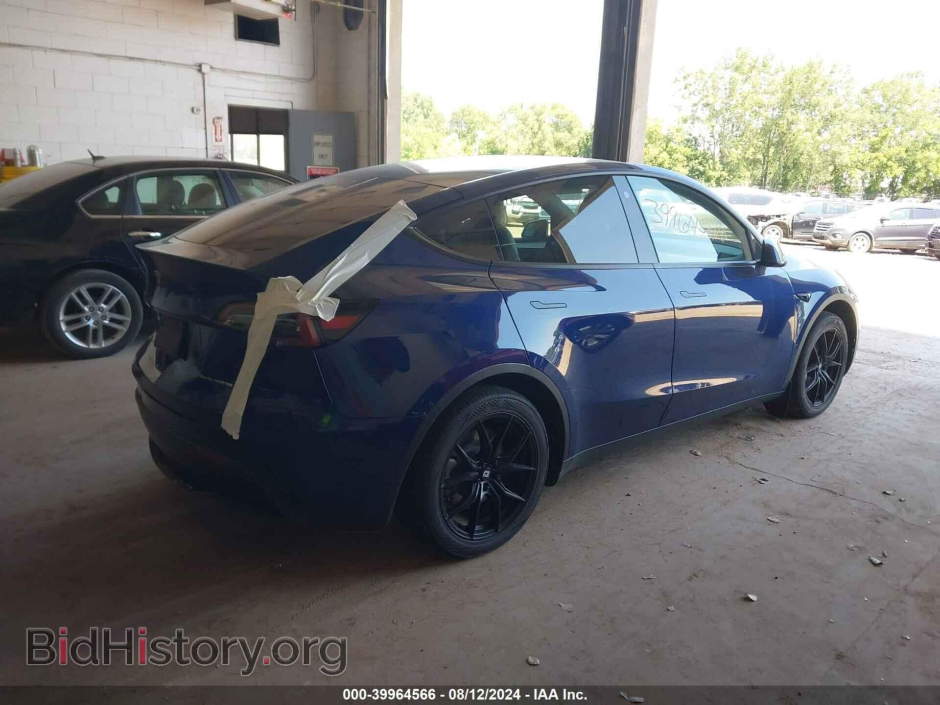 2022 TESLA MODEL Y - VIN: 7SAYGAEE6NF524256 - Photo 4
