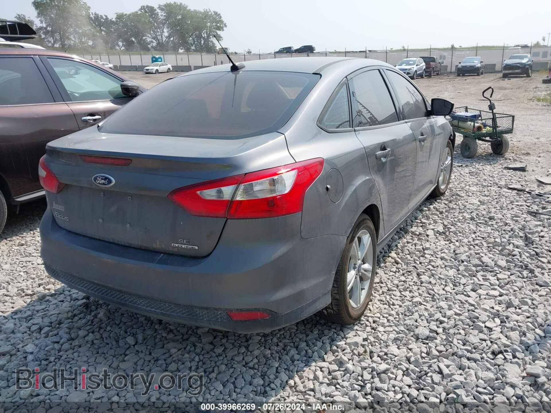 2014 FORD FOCUS - VIN: 1FADP3F20EL390648 - Photo 4