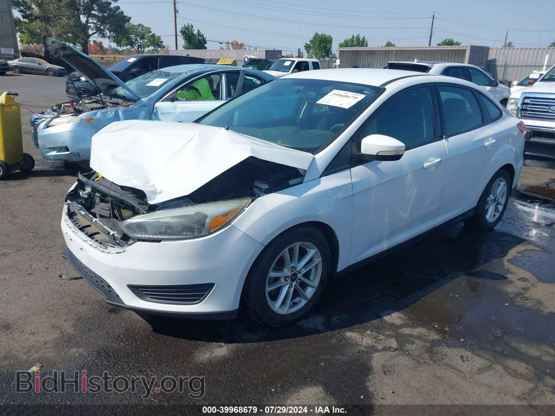 2016 FORD FOCUS - VIN: 1FADP3F21GL268609 - Photo 2