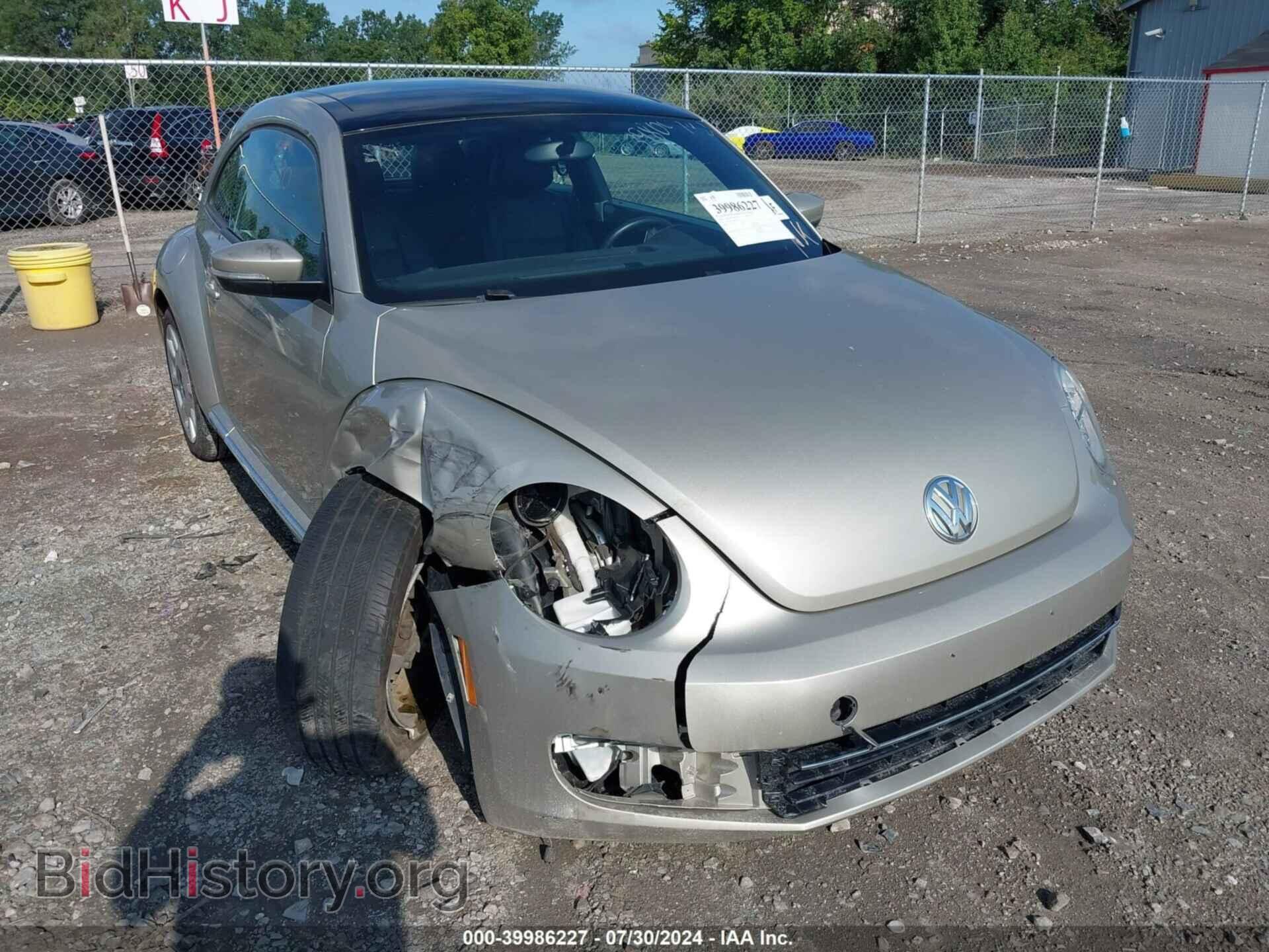 Фотография 3VWJ17AT5EM667134 - VOLKSWAGEN BEETLE 2014