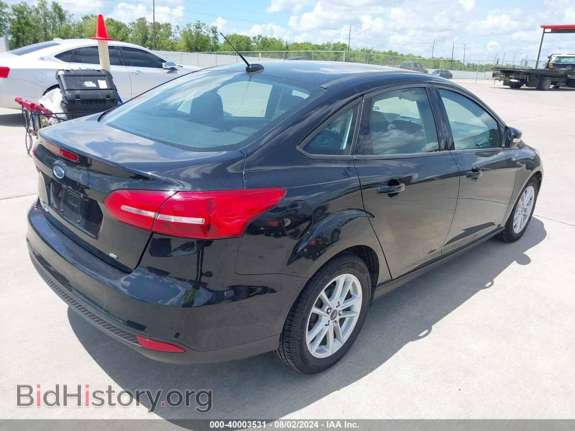 2017 FORD FOCUS - VIN: 1FADP3F24HL268573 - Фото 4