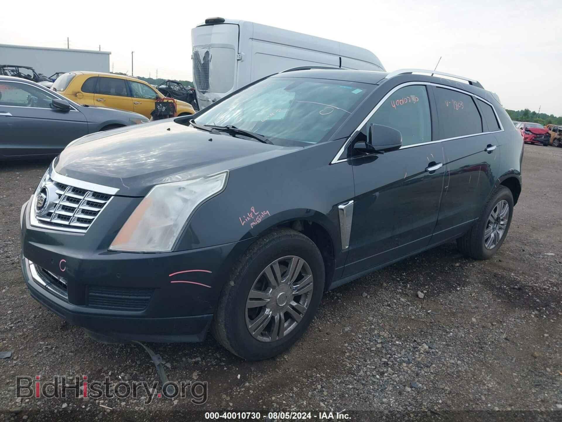 2014 CADILLAC SRX - VIN: 3GYFNBE37ES631803 - Фото 2