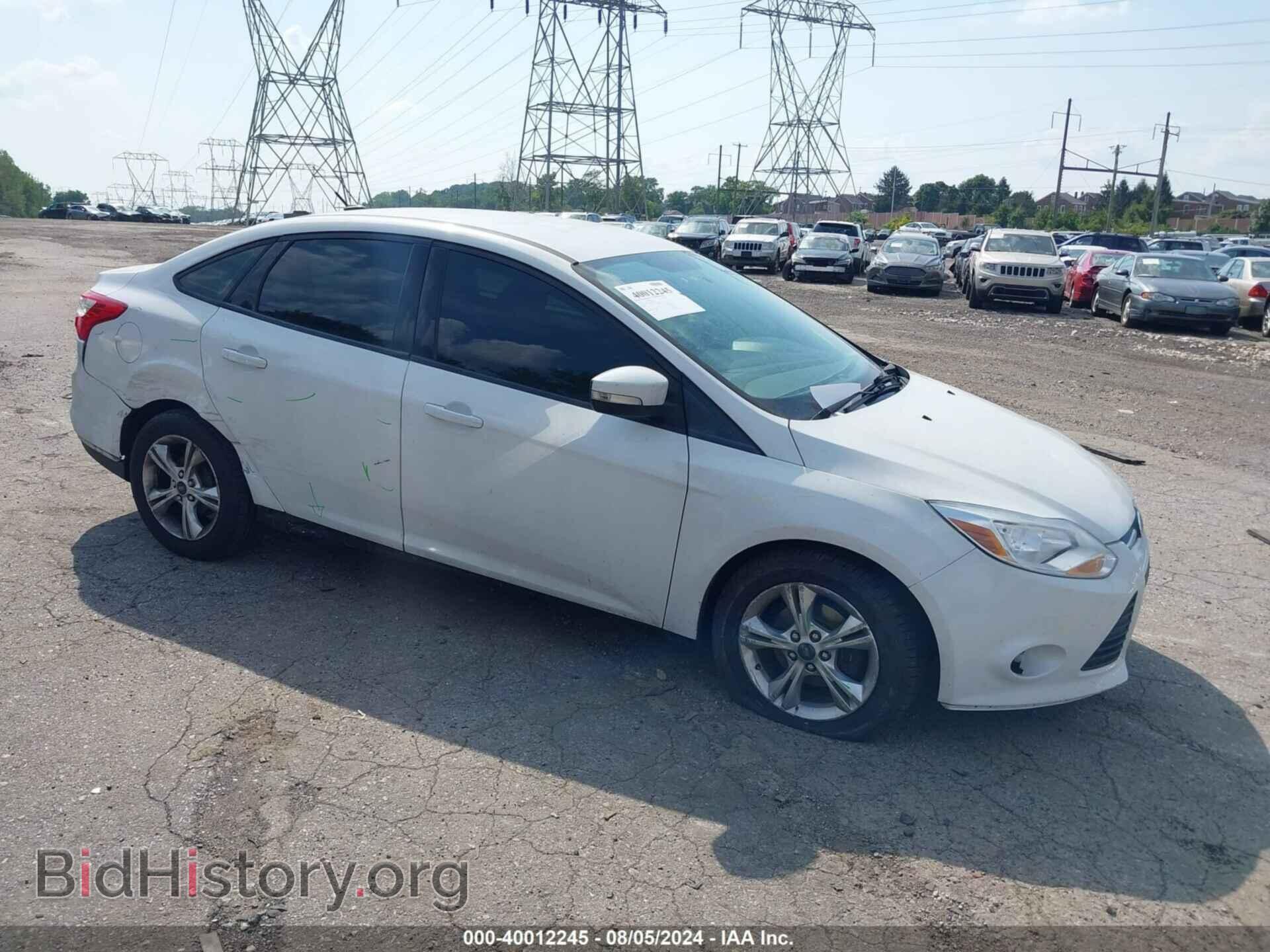 Фотография 1FADP3F25DL185468 - FORD FOCUS 2013