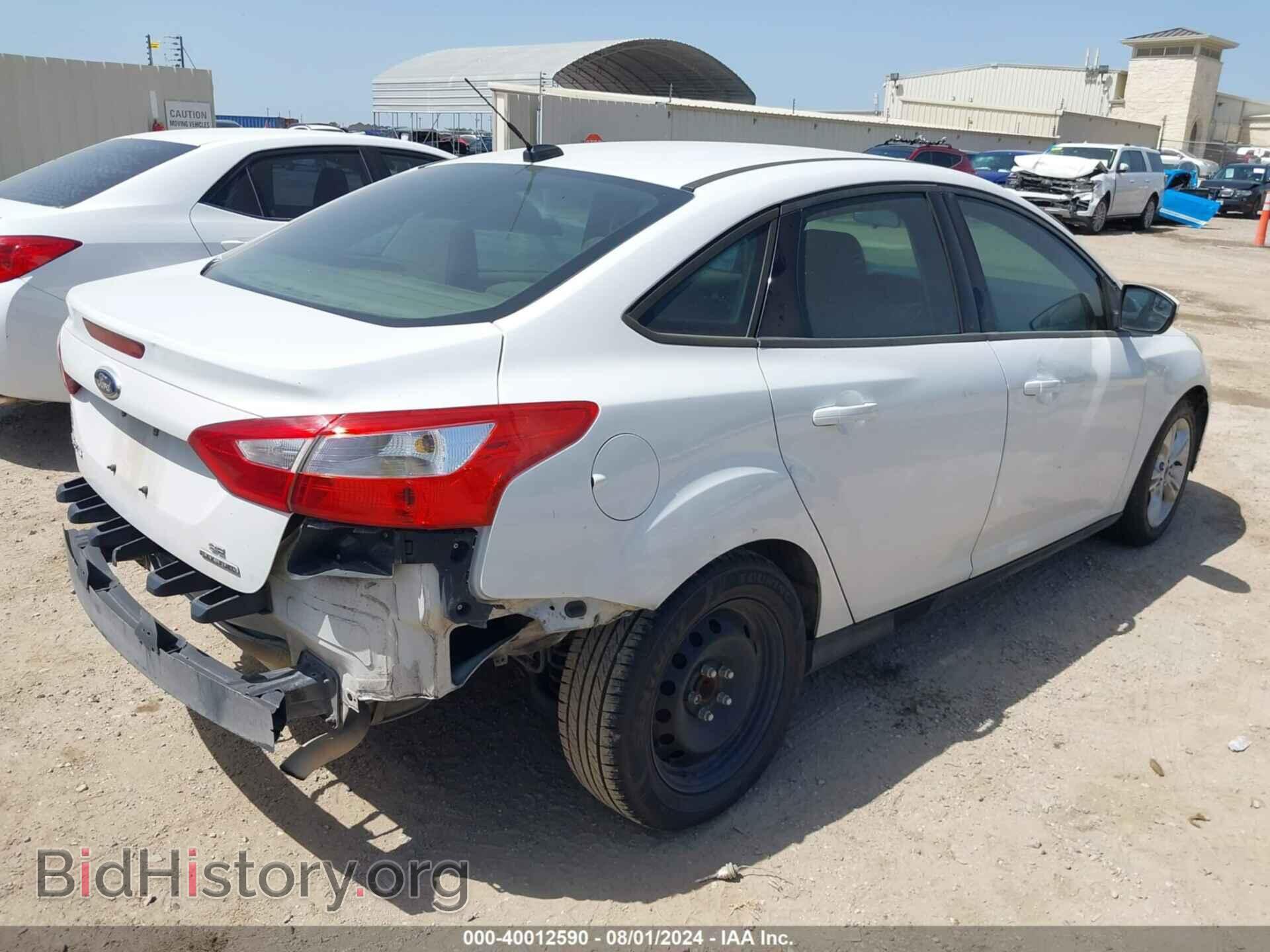 2014 FORD FOCUS - VIN: 1FADP3F27EL175123 - Photo 4