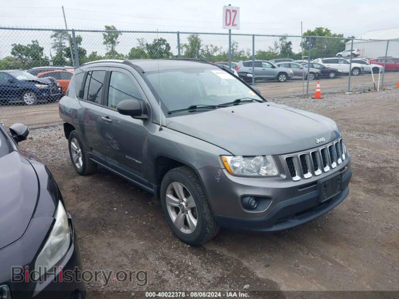 2011 Jeep COMPASS (VIN 1J4NT1FB0BD290791) — photo 1 of 12, IAAI, damage: rear