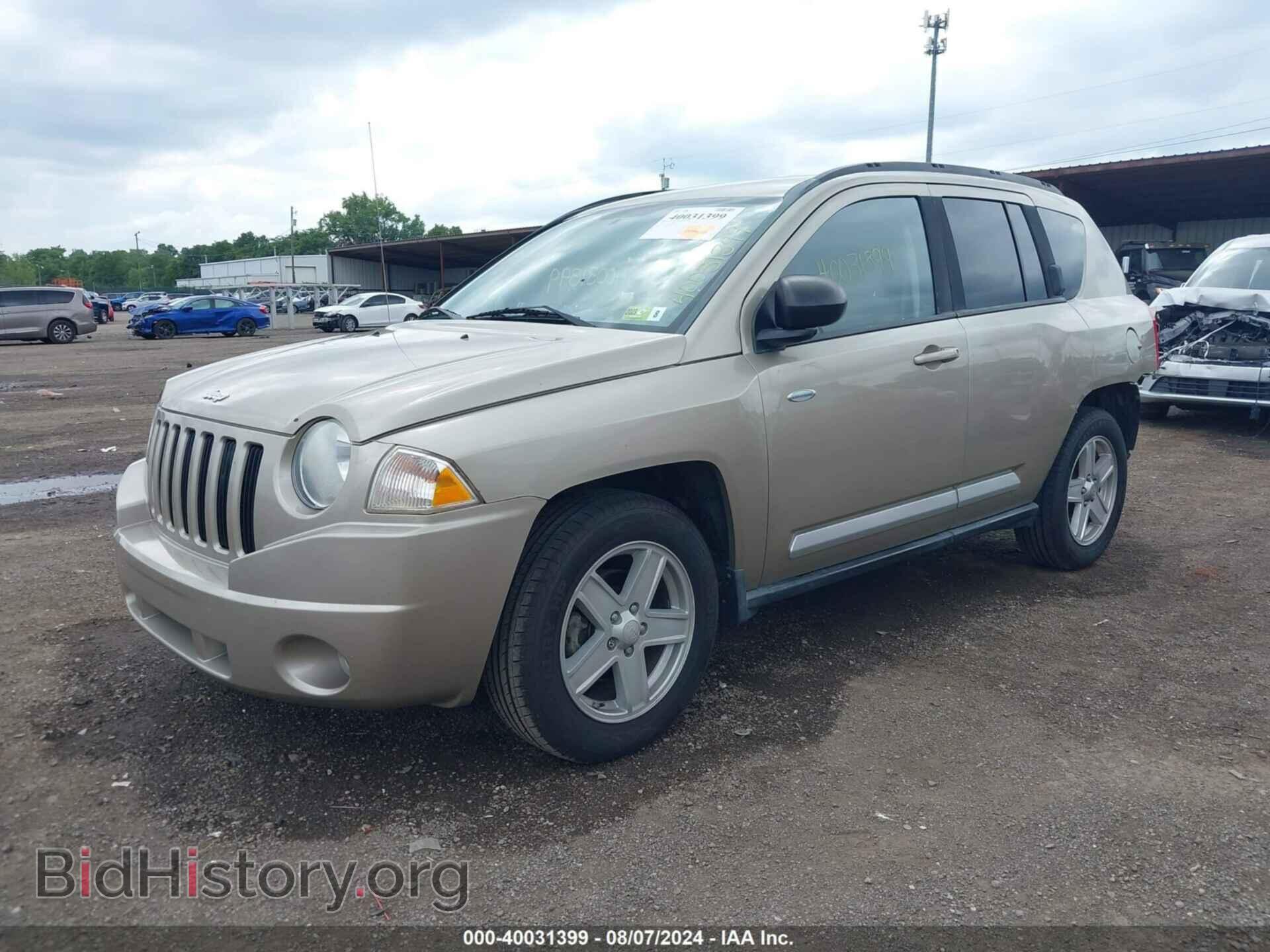 2010 JEEP COMPASS - VIN: 1J4NF1FB5AD642964 - Photo 2