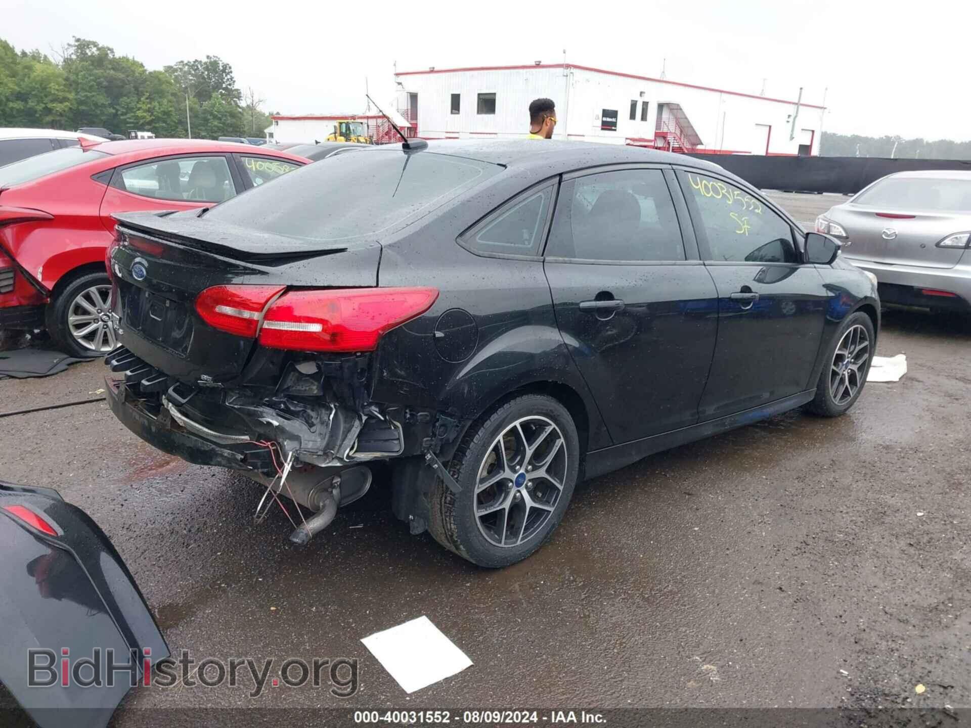 2015 FORD FOCUS - VIN: 1FADP3FE9FL247287 - Photo 4
