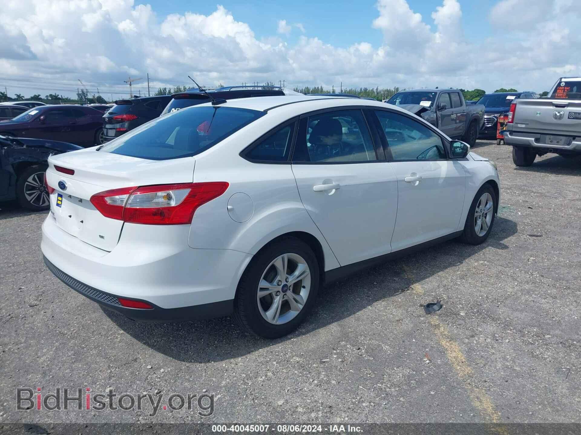2014 FORD FOCUS - VIN: 1FADP3F22EL358980 - Photo 4