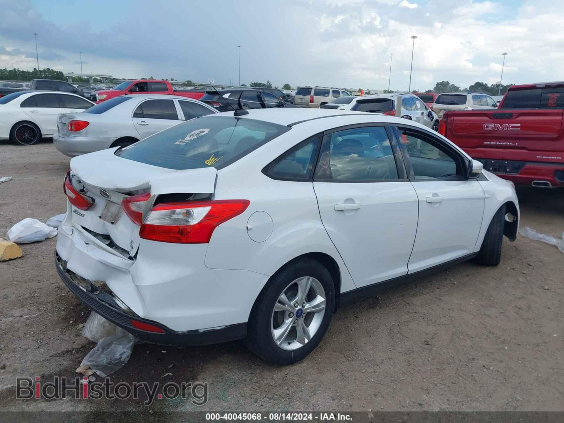 2014 FORD FOCUS - VIN: 1FADP3F26EL390007 - Photo 4