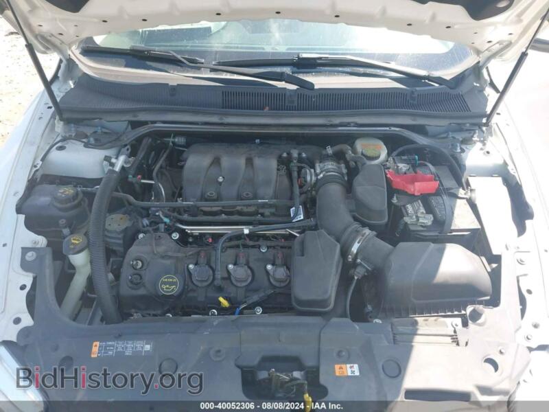 2014 Ford TAURUS (VIN 1FAHP2E82EG143223) — photo 10 of 16