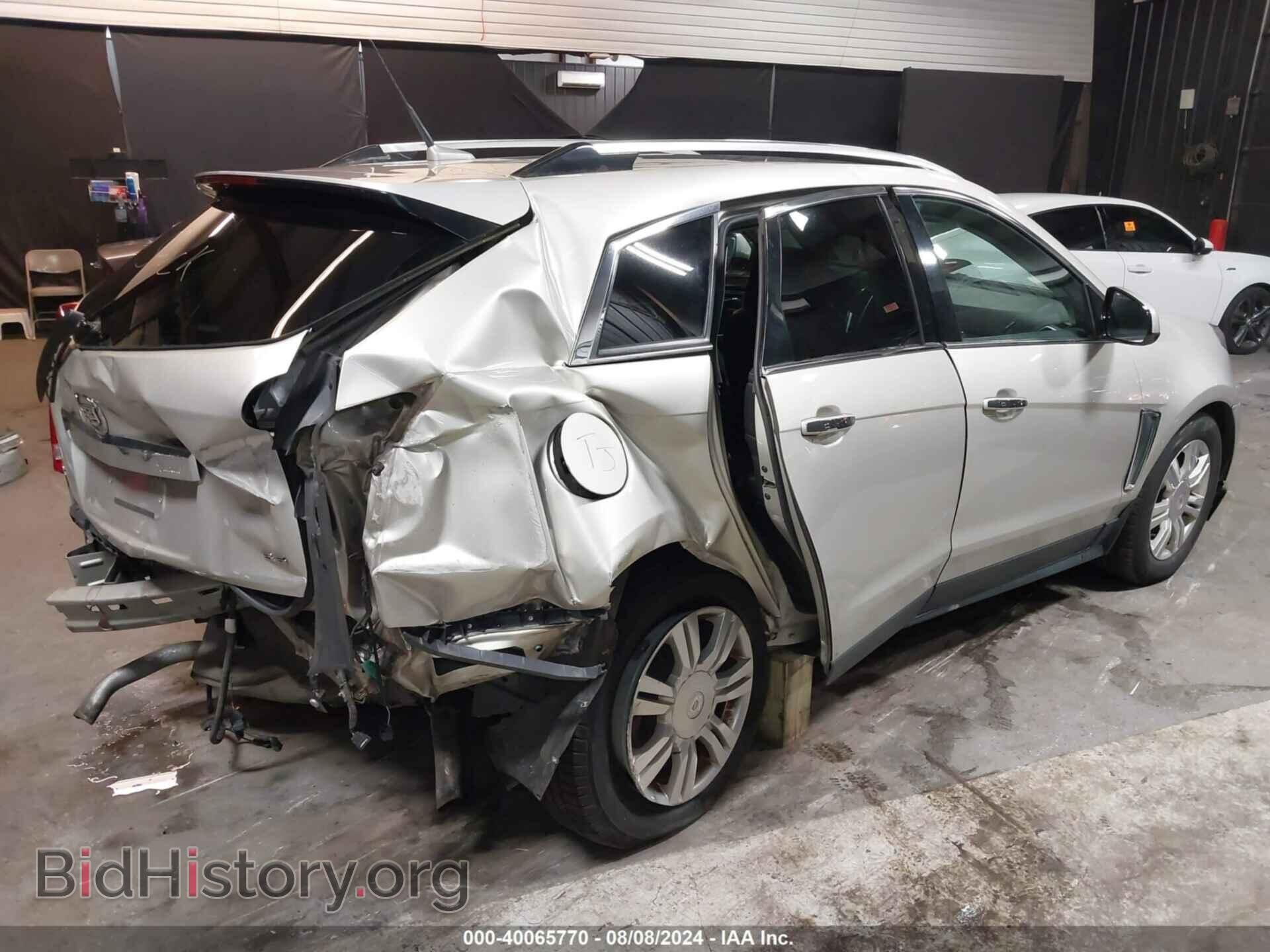 2014 CADILLAC SRX - VIN: 3GYFNBE39ES586735 - Фото 4