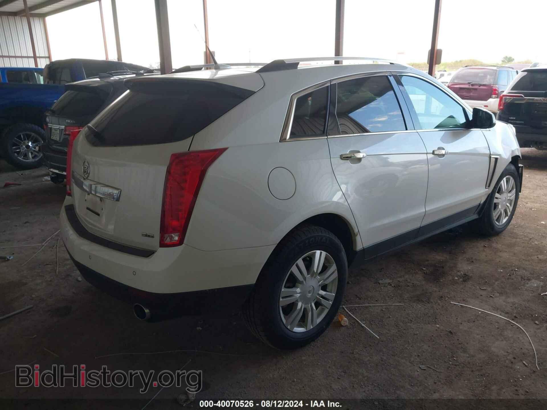 2013 CADILLAC SRX - VIN: 3GYFNCE30DS654103 - Фото 4