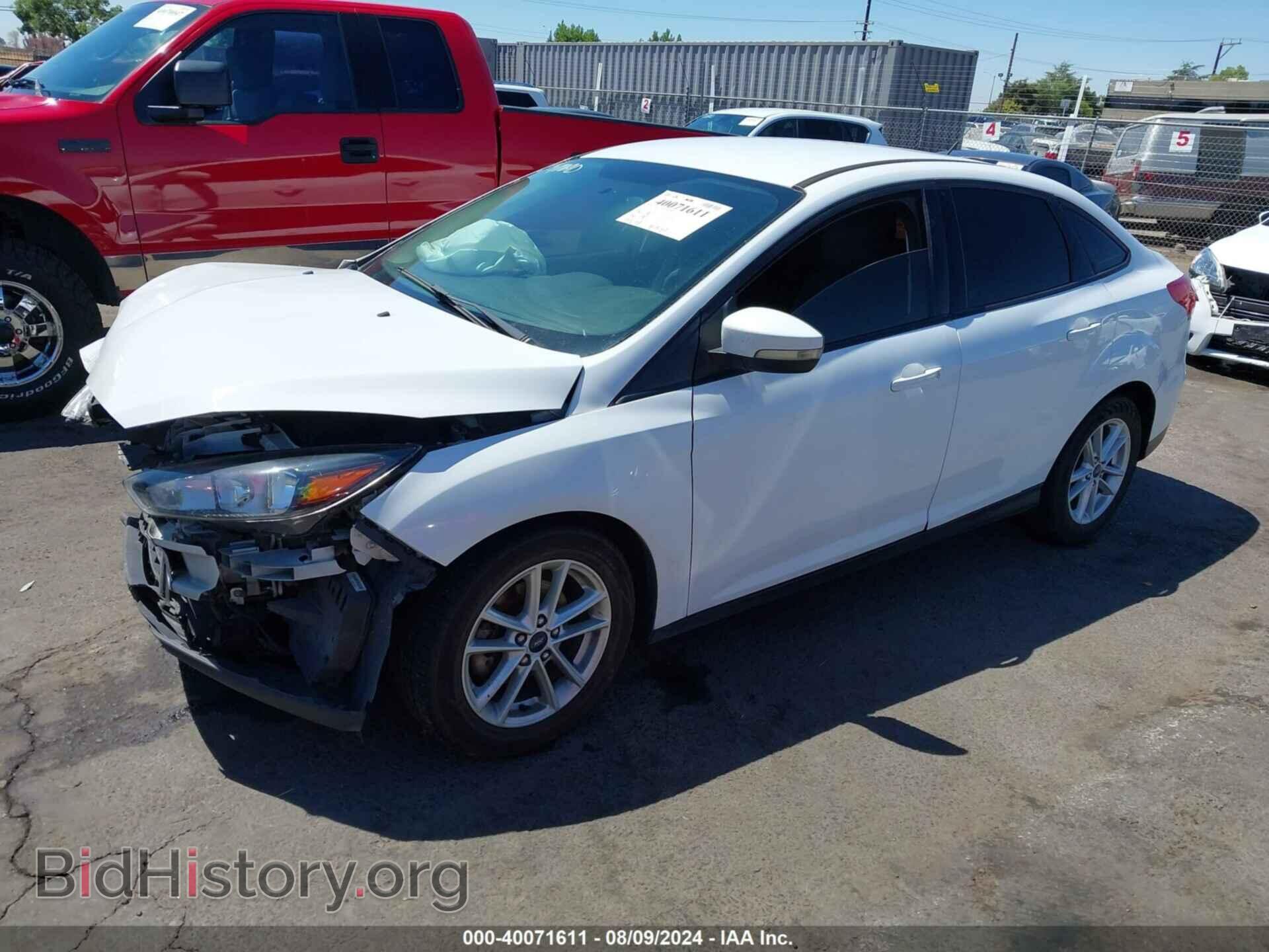 2016 FORD FOCUS - VIN: 1FADP3F20GL406141 - Фото 2