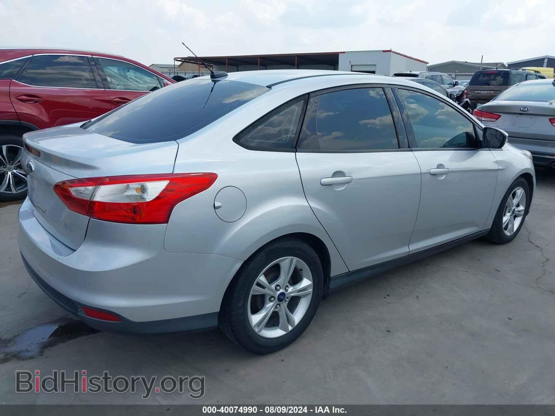 2014 FORD FOCUS - VIN: 1FADP3F20EL349968 - Photo 4