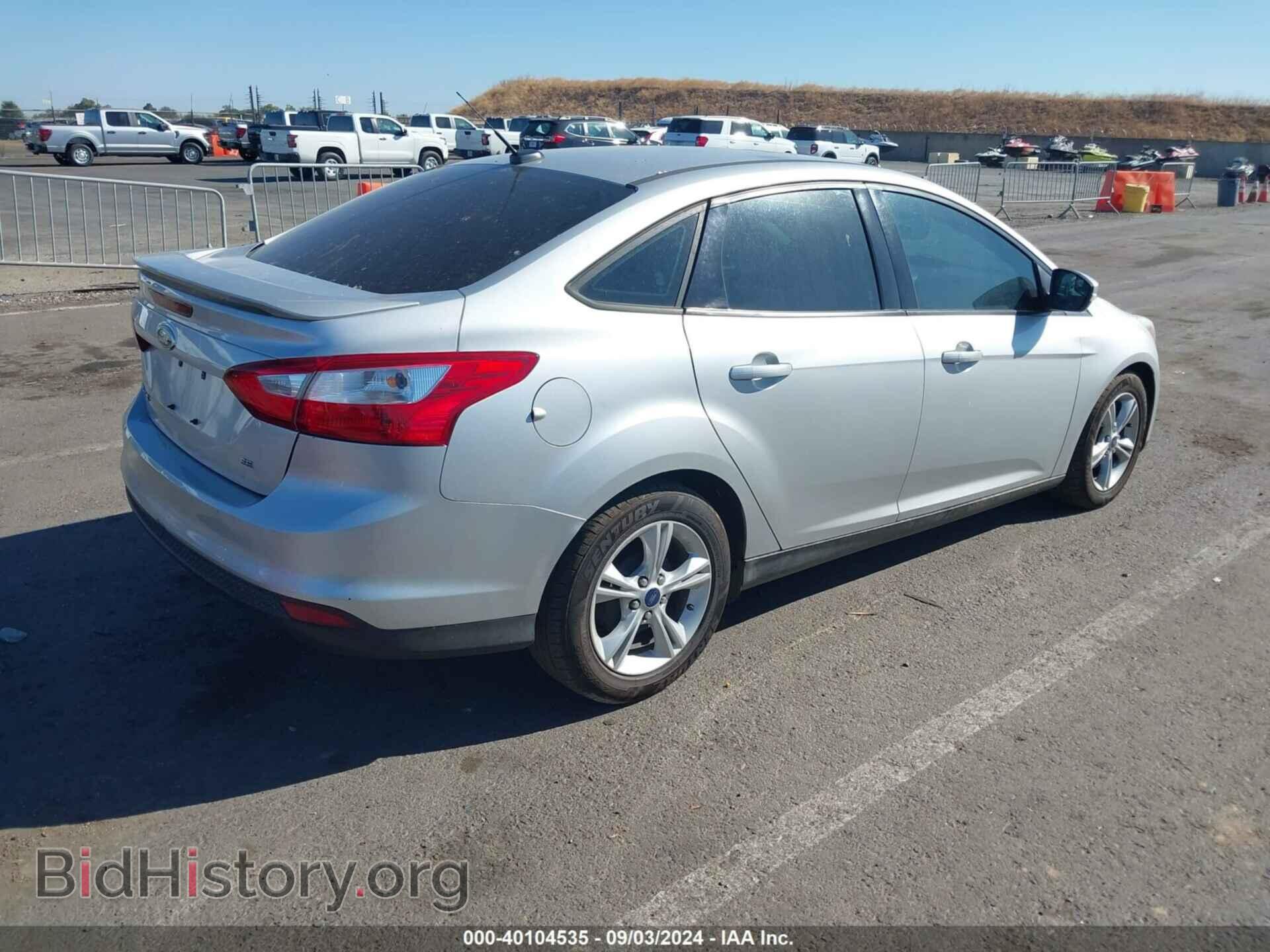 2014 FORD FOCUS - VIN: 1FADP3F28EL442902 - Photo 4