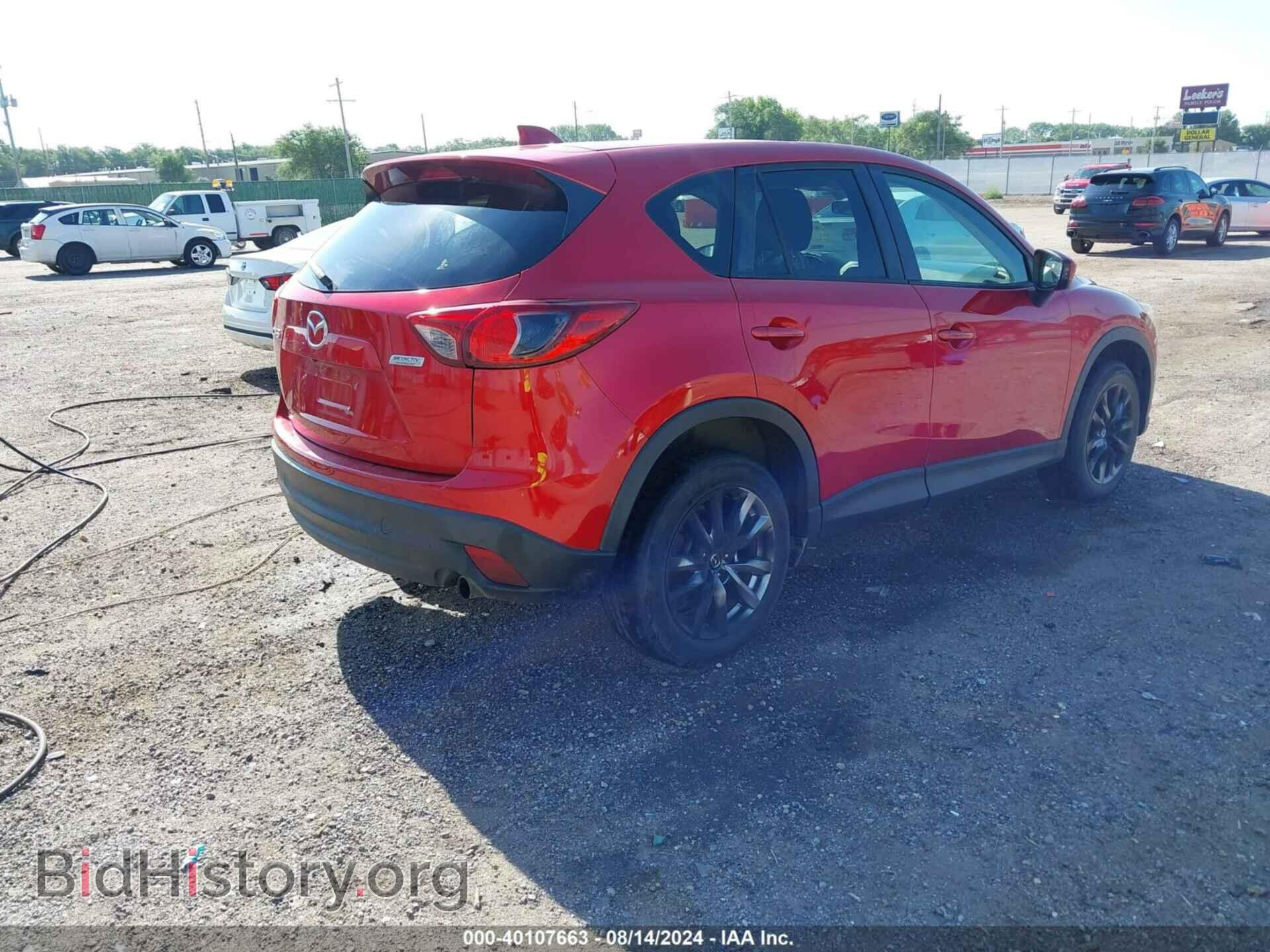 2014 MAZDA CX-5 - VIN: JM3KE2CY8E0387189 - Фото 4