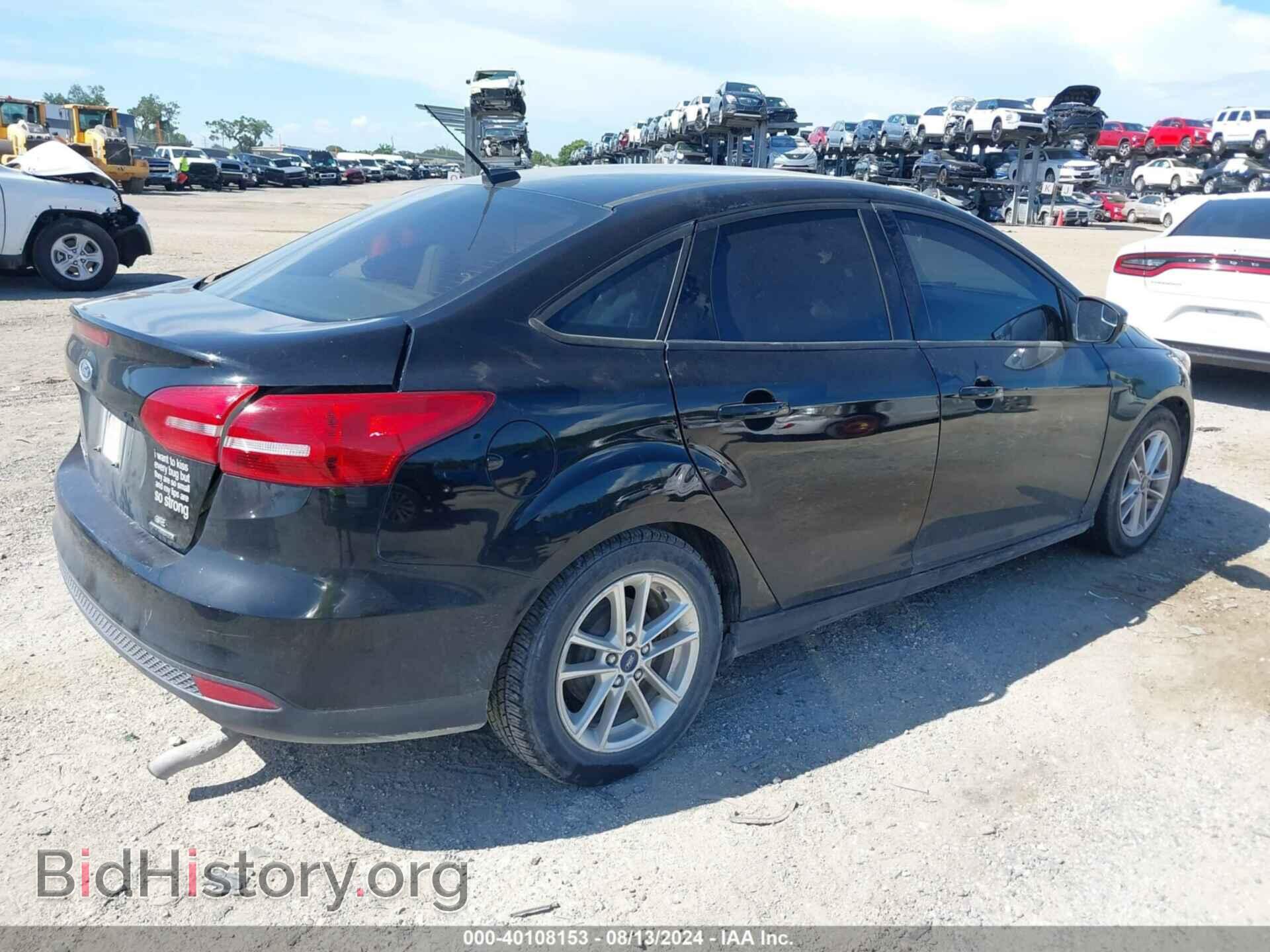 2016 FORD FOCUS - VIN: 1FADP3F2XGL371415 - Photo 4