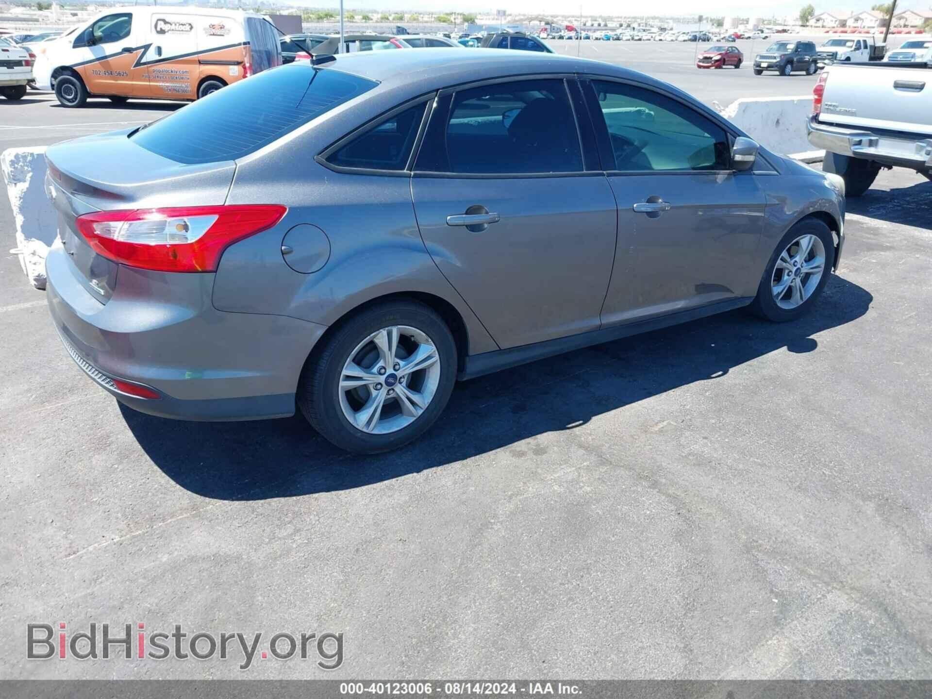 2014 FORD FOCUS - VIN: 1FADP3F28EL400083 - Photo 4