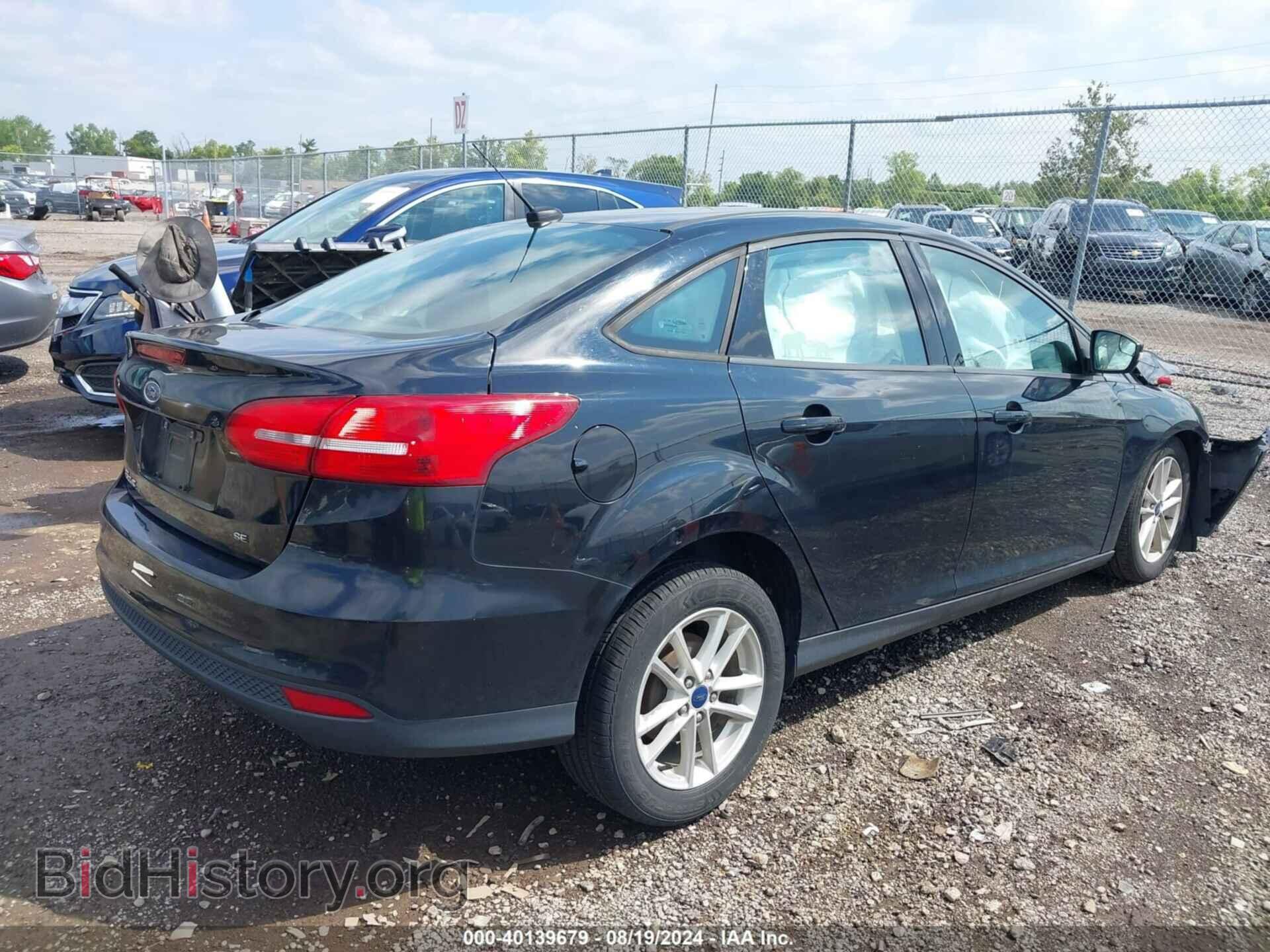 2017 FORD FOCUS - VIN: 1FADP3F2XHL258923 - Photo 4