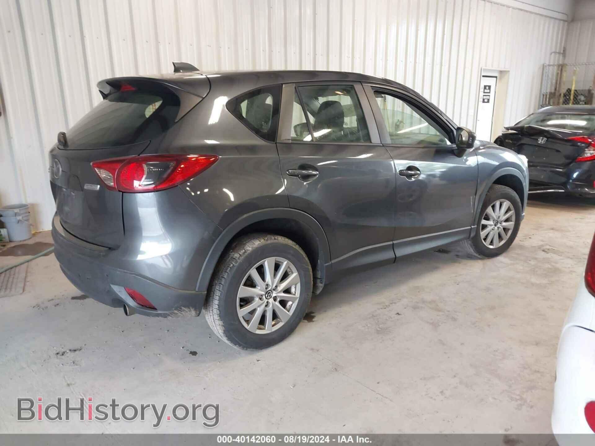 2014 MAZDA CX-5 - VIN: JM3KE2BE4E0415237 - Фото 4