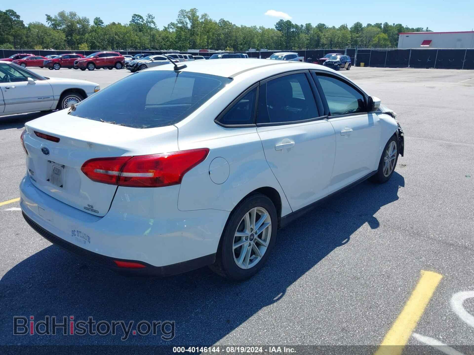 2016 FORD FOCUS - VIN: 1FADP3F28GL216362 - Photo 4