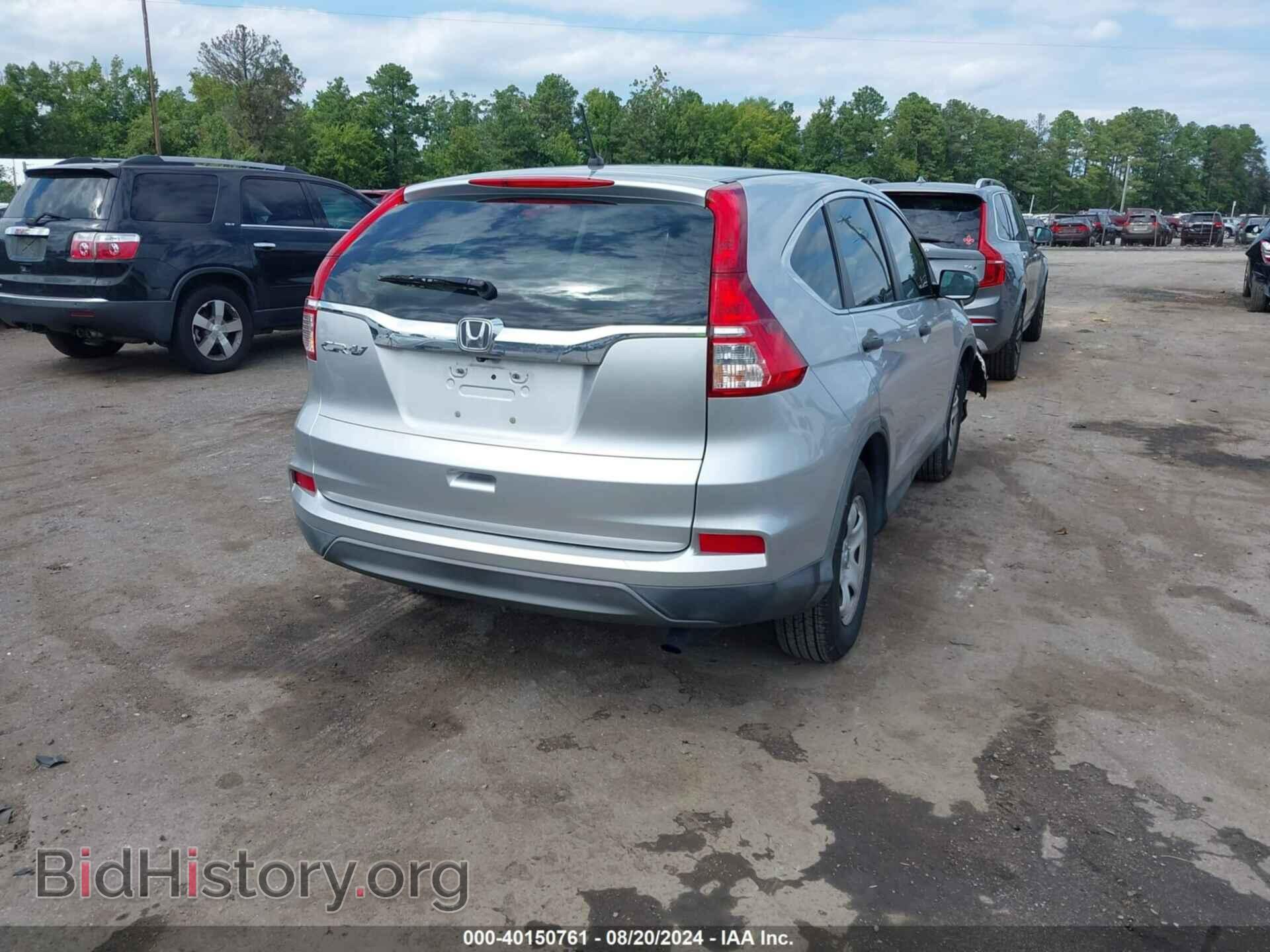 2015 HONDA CR-V - VIN: 3CZRM3H37FG714167 - Фото 4