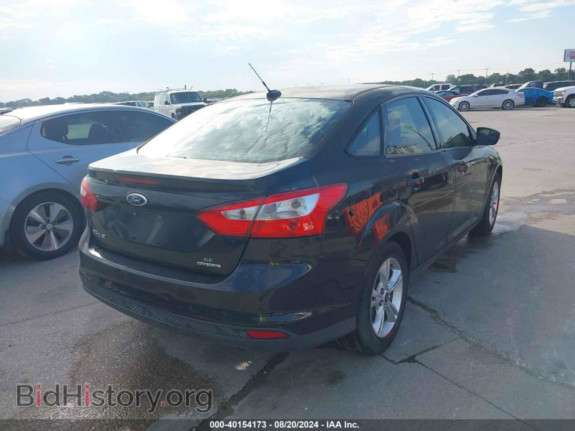 2014 FORD FOCUS - VIN: 1FADP3F20EL171432 - Photo 4
