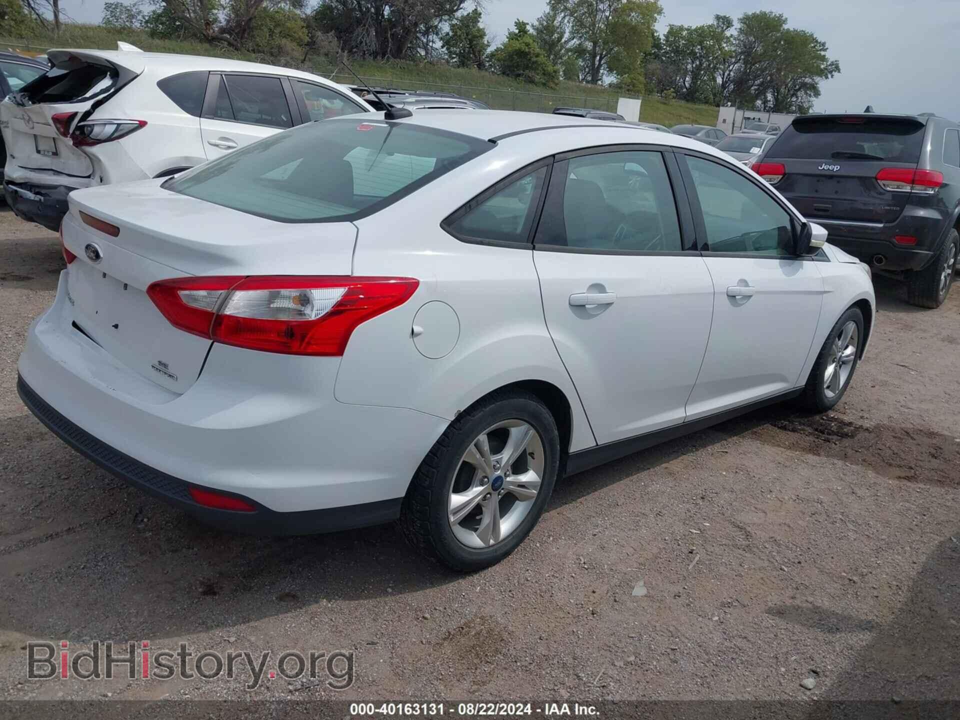 2013 FORD FOCUS - VIN: 1FADP3F21DL307372 - Photo 4