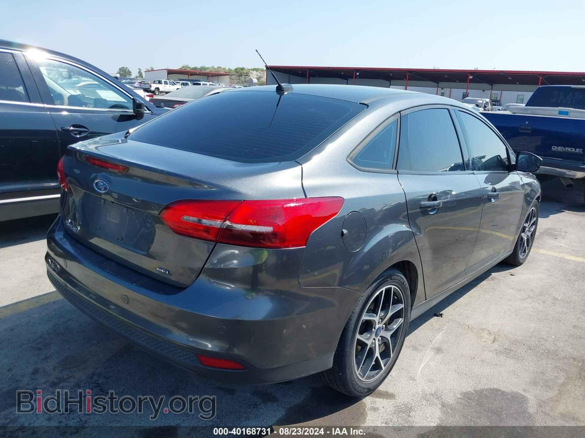 2017 FORD FOCUS - VIN: 1FADP3H29HL342048 - Фото 4