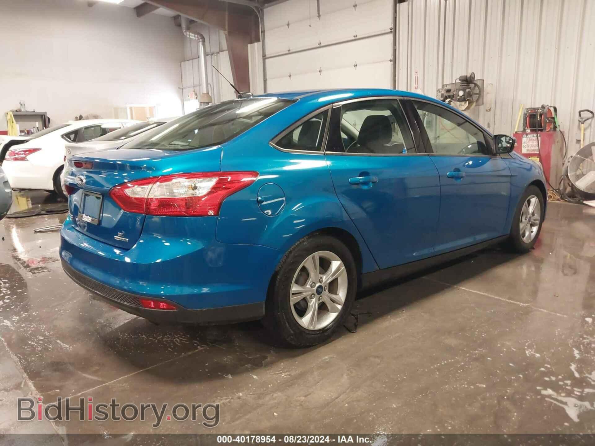 2014 FORD FOCUS - VIN: 1FADP3F21EL153778 - Photo 4