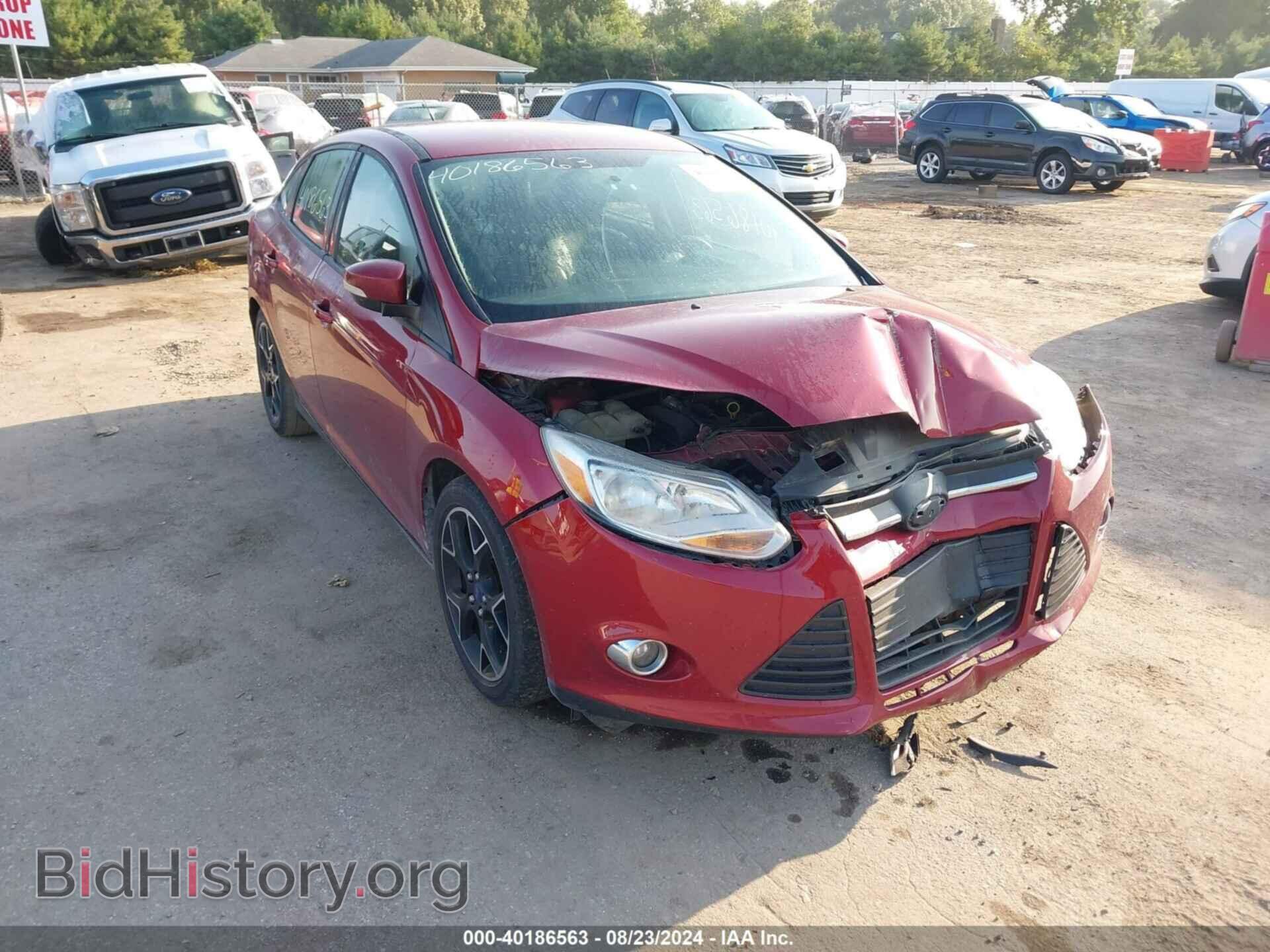 Фотография 1FADP3F26EL107833 - FORD FOCUS 2014