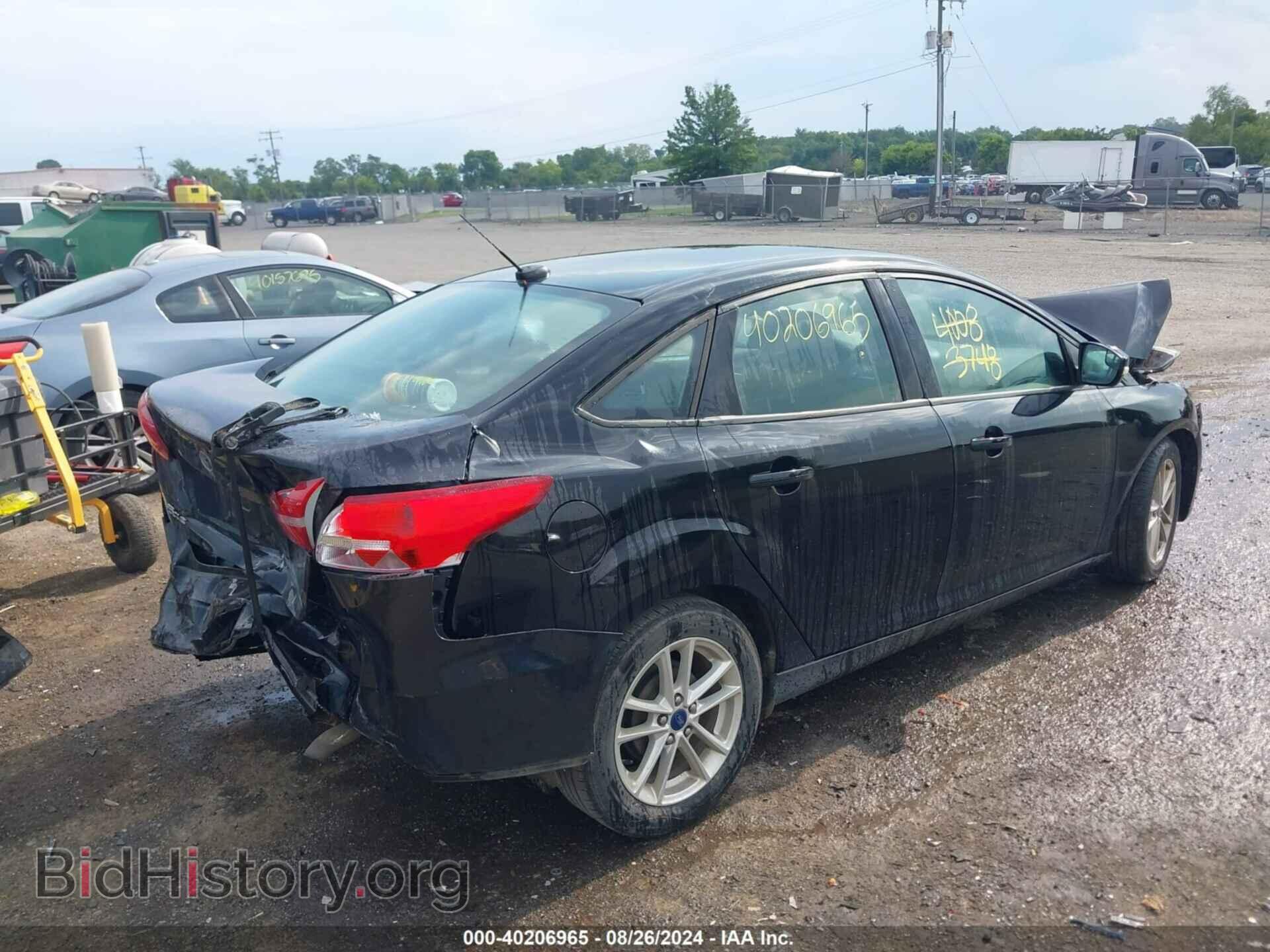 2017 FORD FOCUS - VIN: 1FADP3F2XHL323172 - Фото 4