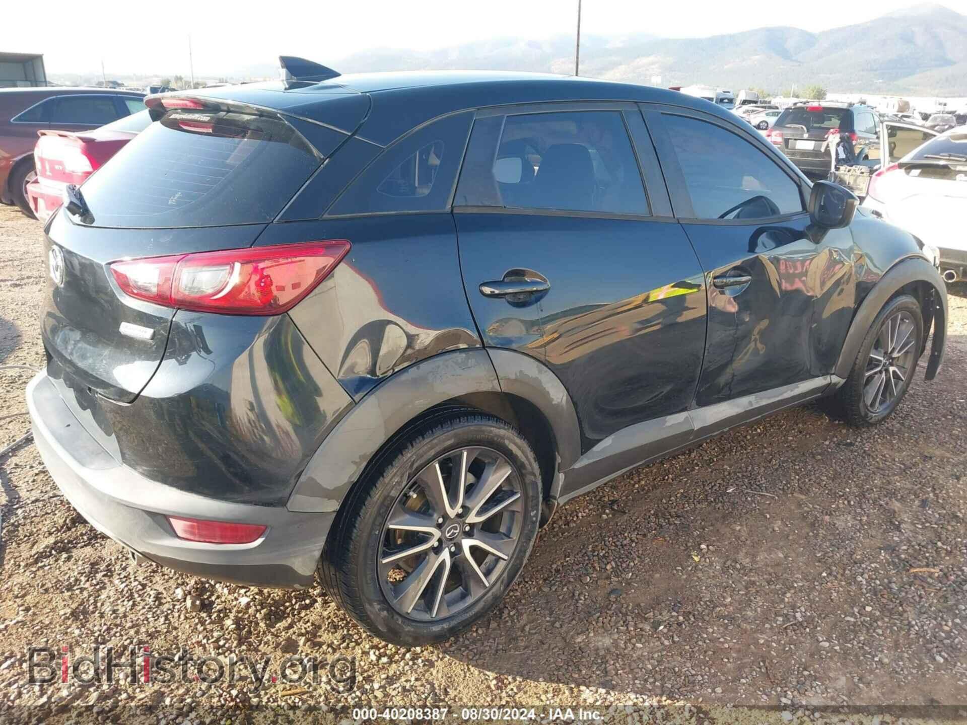 2018 MAZDA CX-3 - VIN: JM1DKFC72J0309204 - Фото 4