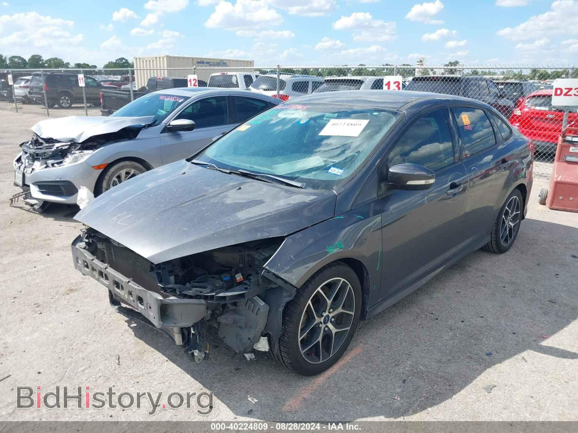 2016 FORD FOCUS - VIN: 1FADP3F29GL275209 - Photo 2