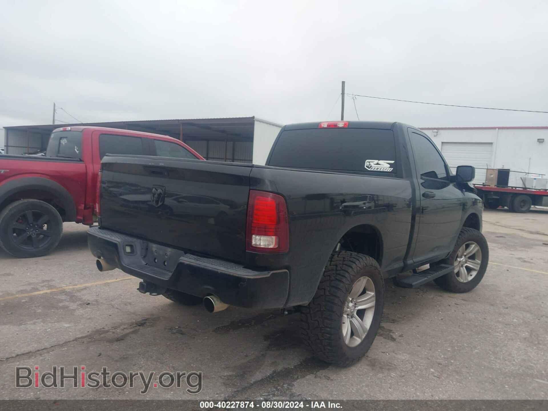 2014 RAM 1500 - VIN: 3C6JR6AT1EG104206 - Фото 4