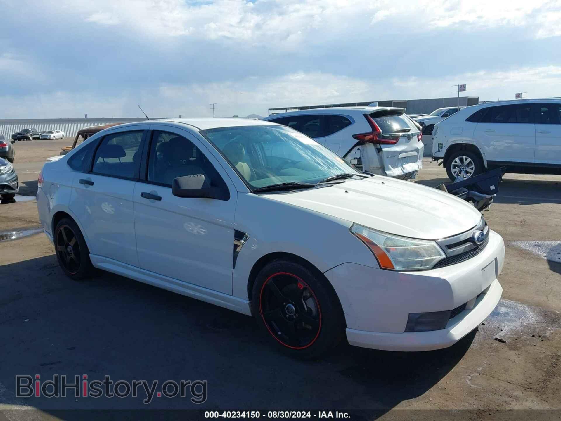 Фотография 1FAHP34N39W157608 - FORD FOCUS 2009