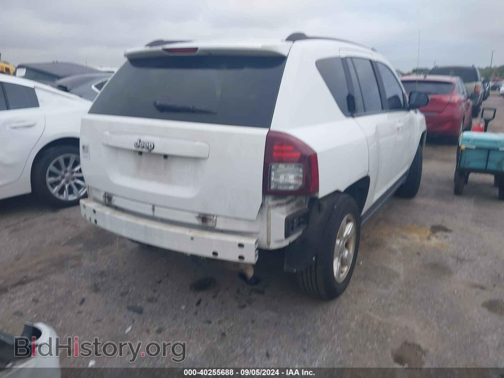 2014 JEEP COMPASS - VIN: 1C4NJCBAXED523990 - Фото 4