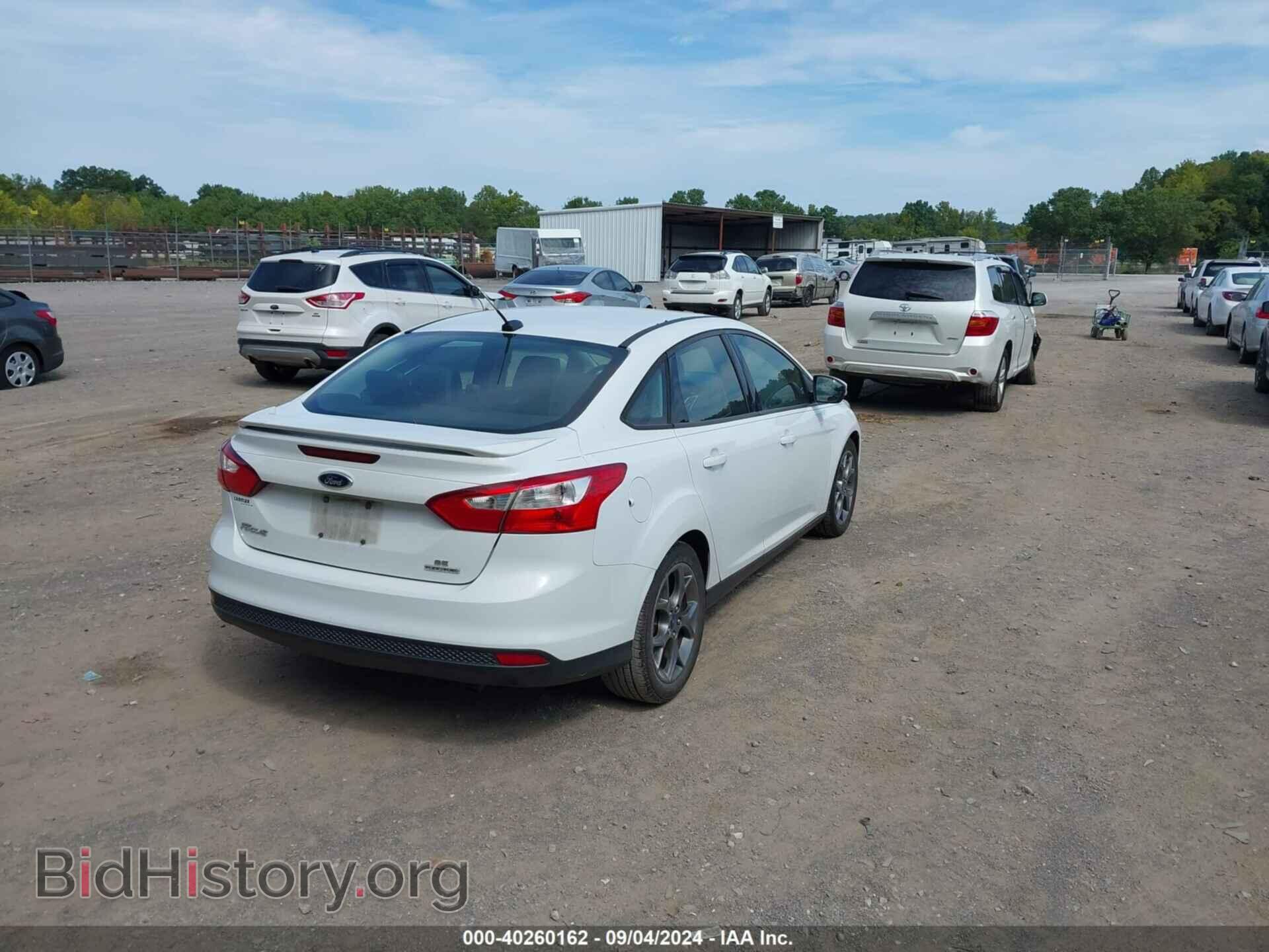 2013 FORD FOCUS - VIN: 1FADP3F28DL195184 - Photo 4