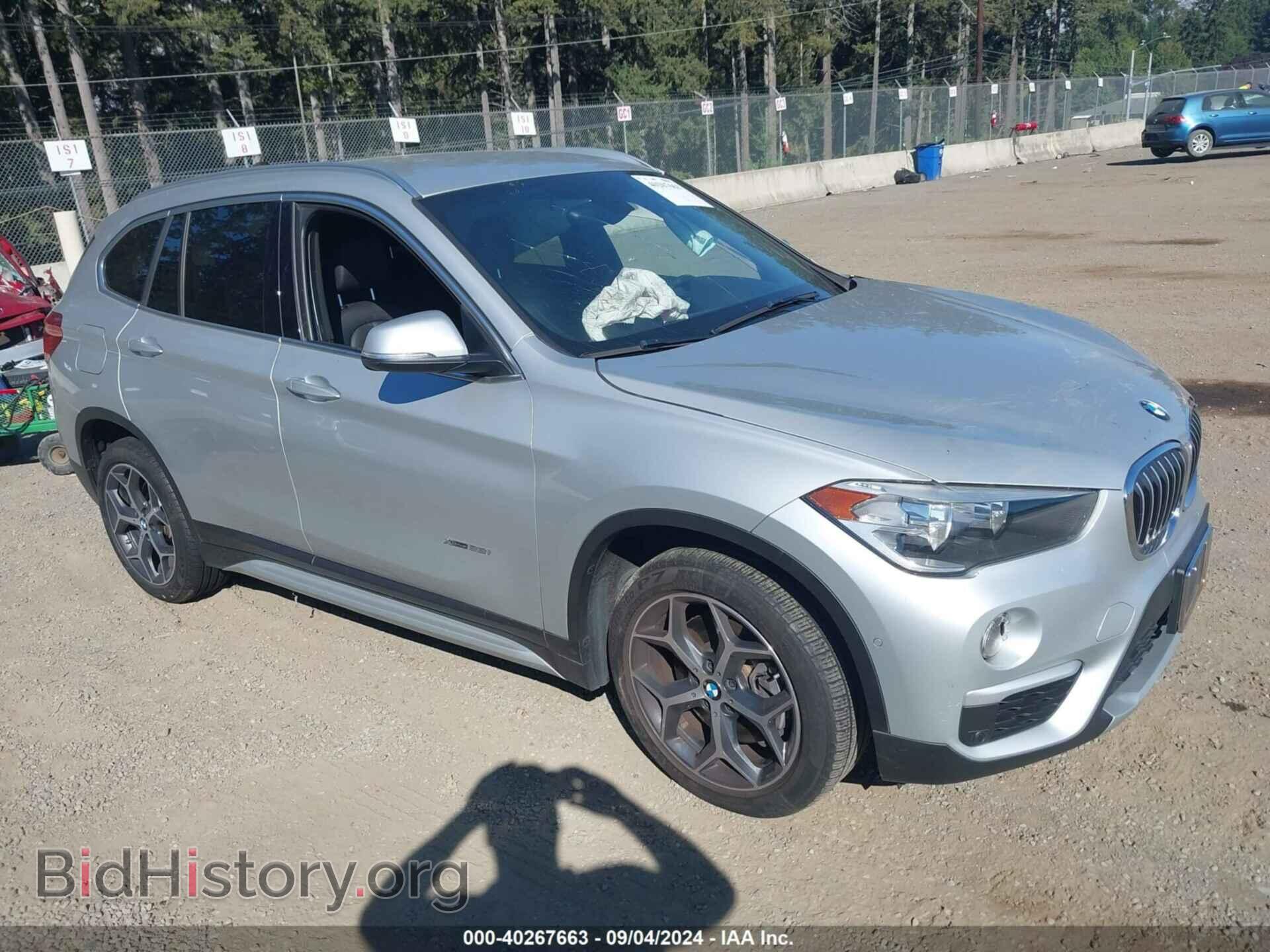 Фотография WBXHT3C38H5F77137 - BMW X1 2017