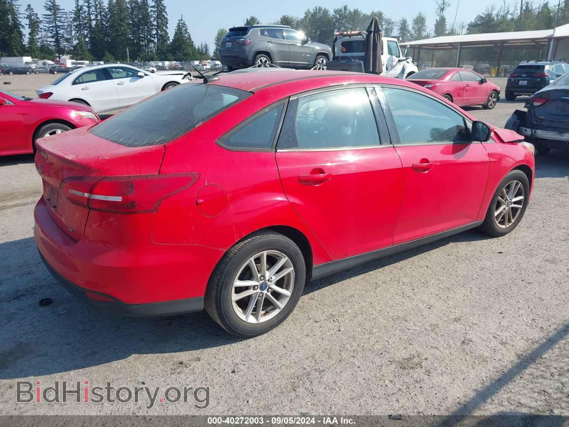 2015 FORD FOCUS - VIN: 1FADP3F21FL295467 - Photo 4