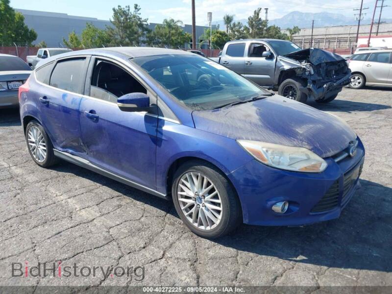 2012 Ford FOCUS SEL (VIN 1FAHP3M27CL299927) — photo 1 of 11, IAAI, damage: left & right side